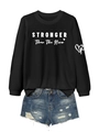 Flat lay of black sweatshirt with 'Stronger Than The Storm' text and ripped denim shorts - S / Black