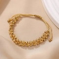 Bohemian handmade beaded bracelet with gold textured beads and adjustable woven cord - Irregular Bumpy Copper Beads