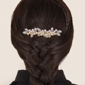 Detail of floral hair comb with pearls and rhinestones on a low fishtail braid - Large Pearl Hair Comb