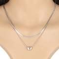 Elegant double layer silver necklace featuring a flat snake chain and heart pendant charm - Silver