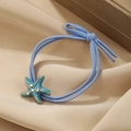 Coletero de estilo océano con estrella de mar azul y banda elástica con pedrería - Estrella de Mar de Diamante