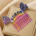 Iridescent butterfly wing and moon phase metal hair comb on gold jewelry box - Colorful