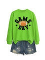 Flat lay of bright green Game Day sweatshirt paired with distressed blue denim shorts - Neon Green (Black Graphic)