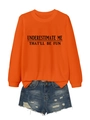 Macro detail of orange long sleeve sweatshirt with printed slogan and denim shorts - Orange