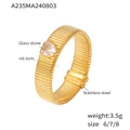 Goldener Edelstahlring mit Stufenstruktur und einem herzförmigen blauen Glasstein - Gold Band White Stone