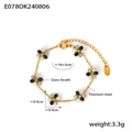 Bohemian floral bracelet with grey and black glass beads on a gold titanium steel chain - Bracelet - Black