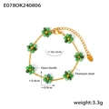Golden titanium steel bracelet with green glass bead flowers and lobster clasp - Bracelet-Green