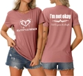 Vue détaillée du t-shirt rose poudré avec graphisme imprimé et slogan au dos du vêtement - Or Rose (Graphique Blanc)