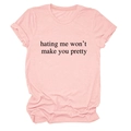 Detail shot of pink cotton t-shirt with 'hating me won't make you pretty' slogan print - Pink (Black Text)