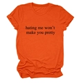 Detail of soft orange cotton T-shirt featuring 'hating me won't make you pretty' slogan print - Orange (Black Font)