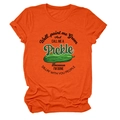 Detailed flat lay of an orange cotton T-shirt featuring a green pickle graphic design - Orange (Black Text)