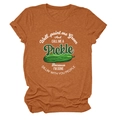 Close-up of knit fabric texture and pickle print on orange cotton T-shirt for women - Burnt Orange (White Text)