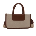 Versatile canvas and brown leather tote bag with wide strap for daily commuting - Brown