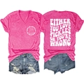 Detail view of hot pink V-neck T-shirt with pickles slogan and distressed denim shorts - Rose Red