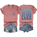 Detail view of pink V-neck t-shirt with Lake theme print and ripped denim shorts - Rose Gold