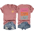 Detail of V-neck Lake Days T-shirt and ripped denim shorts set in summer casual style - Rose Gold (Black Print)