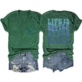 Flat lay of lake-themed V-neck t-shirt and denim shorts set with back and front view - Vintage Green