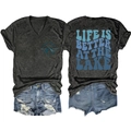 Flat lay of gray V-neck tee with 'Life is Better at the Lake' print and denim shorts - Black Heather Grey