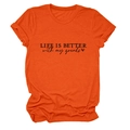 Detail of orange t-shirt featuring Life is Better with My Grands quote and heart icon - Orange (Black Font)