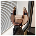 Close-up of contrast color plaid crescent bag with gold metal buckle and leather handle - Khaki