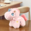Pink plush unicorn keychain with blue glitter horn and yellow star embroidery on wood - Pink