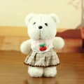 Süßer weißer Teddybär Plüschtier mit rosa Spitzenlatz und braunem kariertem Rock - Beige