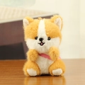 Portachiavi peluche Shiba Inu con nastro rosa su un piccolo ciondolo marrone e bianco - Stile Zaino Rosso