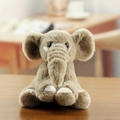 Cute light brown plush elephant keychain featuring long soft fur and ivory details - Brown