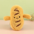 Cute plush baguette toy with smiling face and soft orange long fur texture - Baguette Style B