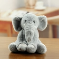 Cute gray plush elephant keychain with soft texture and white tusks on wooden background - Gray