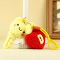 Cute yellow bear plush keychain with a red heart ball and golden bell accessory - Yellow