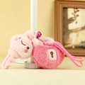Pink rabbit plush keychain with heart lock pendant and purple bell accessory - Pink