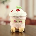 Cute pink and white cupcake plush keychain charm with a friendly smiley face - Pink