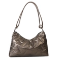 Quilted bronze metallic puffer shoulder bag with stylish stitching and knotted strap - Champagne
