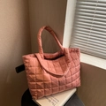 Chic quilted down tote bag in dusty rose pink with a metallic snap button closure - Pink