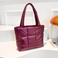 Quilted puffer tote bag in deep purple with glossy finish and square stitch pattern - Red