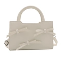 Creamy white patent leather mini bag with 3D bow accents and adjustable shoulder strap - White