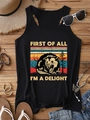 Flat lay of a black racerback tank top with retro possum print on wooden floor - Black