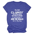 Close-up of rolled cuffs and white screen-printed slogan on royal blue cotton T-shirt - S / Tops / Retro Blue (White Text)