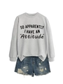 Detail showing grey crewneck sweatshirt with 'Attitude' print and distressed denim shorts - Grey Sweatshirt (Black Font)