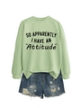 Detail of mint green sweatshirt with 'Attitude' text and distressed denim shorts - Olive Green Sweatshirt (Black Font)