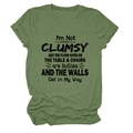 Detailed flat lay of olive green cotton T-shirt with black I'M NOT CLUMSY slogan print - S / Tops / Olive Green (Black Font)