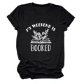 Detail of soft cotton crewneck T-shirt with white floral book print and 'Booked' text - Black (White Letters)