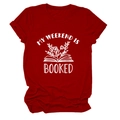 Detail of burgundy T-shirt showing My Weekend is Booked graphic with floral book print - Red (White Letters)