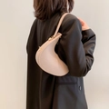 Minimalist beige half-moon shoulder bag in matte leather with gold hardware detail - Khaki
