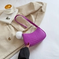 Purple quilted shoulder baguette bag with white pompom charm on corduroy jacket - Purple