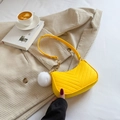 Bright yellow quilted crossbody bag with gold chain strap and white plush pom pom charm - Yellow
