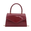 Deep red patent leather crossbody bag with top handle and gold chain strap - Red