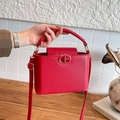 Elegant red litchi texture top handle bag with golden CB logo and adjustable shoulder strap - Red