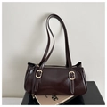 Close-up of dark brown Boston bag with polished texture and gold buckle details - Dark Brown
